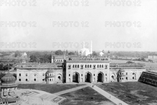 Turkish Gate' at the Bara Imambara. View of the 'Turkish Gate' at the Bara Imambara, a Shia Islam monument built by Nawab Asaf-ud-Daulah (r.1775-97) in 1784. The twin minarets of the Mosque of Aurangzeb can be seen in the distance to the north. Lucknow, United Provinces (Uttar Pradesh), India, January 1934. Lucknow, Uttar Pradesh, India, Southern Asia, Asia.