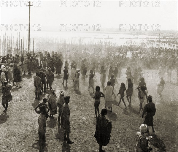 Triveni Sagam at the Ardh Kumbh Mela. Thousands of Hindu pilgrims descend on the Triveni Sangam (the holy confluence of the Yamuna, Saraswati and Ganges Rivers) during the Ardh Kumbh Mela. Allahabad, United Provinces (Uttar Pradesh), India, January 1936. Allahabad, Uttar Pradesh, India, Southern Asia, Asia.