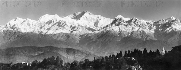 Panoramic view of Kanchenjunga. Panoramic view of the Himalayan mountain Kanchenjunga. India-Nepal border, circa 1919. India, Southern Asia, Asia.