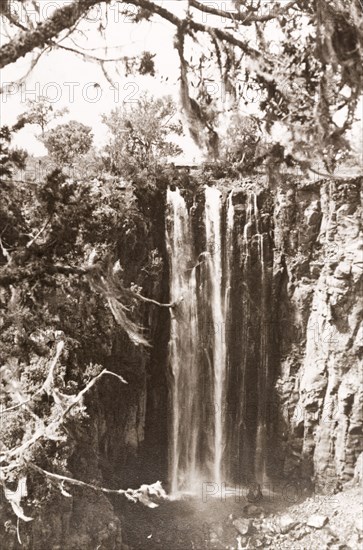 Thomson's Falls, Kenya. View of Thomson's Falls, a waterfall on the Ewaso Nyiro River, approximately 72 metres high. The falls were named after British explorer Joseph Thomson (1858-1895), who encountered them during an expedition to Lake Victoria with the Royal Geological Society in the 1880s. Near Nyahururu, Rift Valley, Kenya, 1934. Nyahururu, Rift Valley, Kenya, Eastern Africa, Africa.