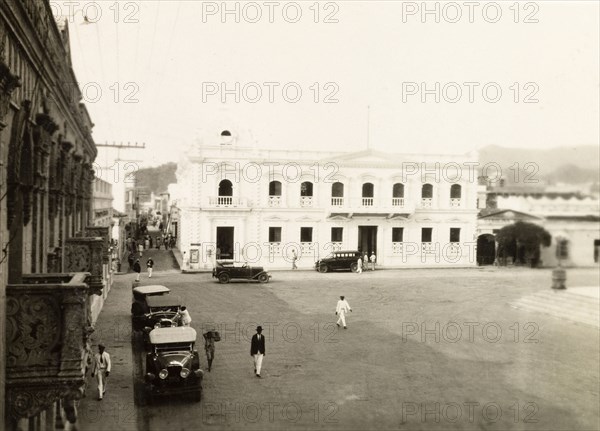 Government building, Santa Marta. View of a government building in a large city square in Santa Marta. Santa Marta, Colombia, circa 1931. Santa Marta, Colombia, Colombia, South America, South America .