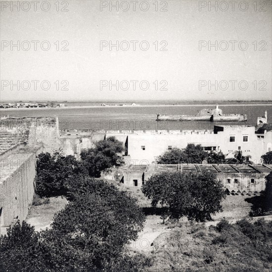 The old fort on Diu Island. View over the old fort on Diu Island, built by the Portuguese during the mid 16th century. Diu Island, Daman and Diu, India, circa 1937. Diu, Daman and Diu, India, Southern Asia, Asia.