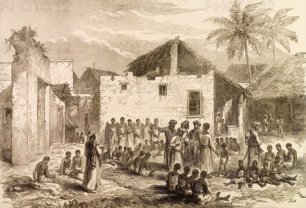 The Slave Market, Zanzibar'. An engraving from the 'Illustrated London News' depicts Arab merchants bartering over African slaves at a market in Zanzibar. Zanzibar was the hub of the East African slave trade, transporting thousands of slaves to Arabia and Asia each year. Zanzibar (Tanzania), 1872. Tanzania, Eastern Africa, Africa.