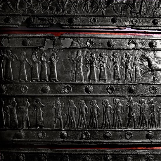 The wooden gates of Shalmaneser III with band relief decoration in bronze