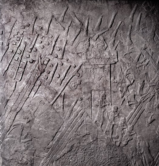 Stone relief from the palace of Sennacherib, depicting the assault on the gate tower of Lachish