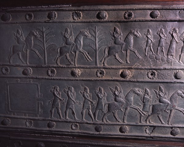 The wooden gates of Shalmaneser III with bands of relief decoration in bronze