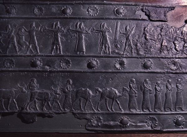 The wooden gates of Shalmaneser III with bands of relief decoration in bronze