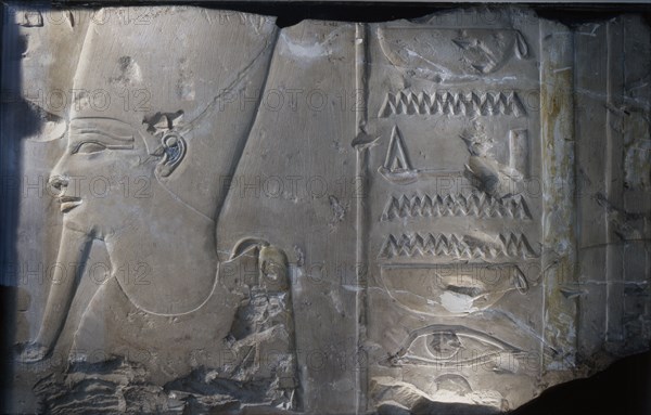 Temple wall relief depicting the head of Osiris, god of the underworld