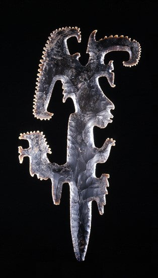 Eccentric axe with representation of a lord