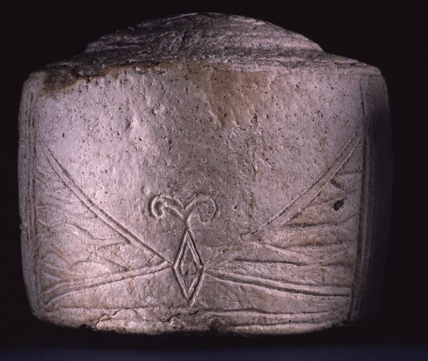 One of the three Folkton drums, found in a child burial in a round barrow excavated by William Greenwell in 1889