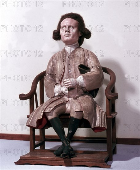 A Danish businessman of the Danish Asian Company, seated in a Chinese chair