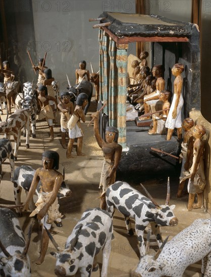 Wooden model depicting the tomb owner Meketre and his son, assisted by scribes and herdsmen, inspecting and counting his livestock