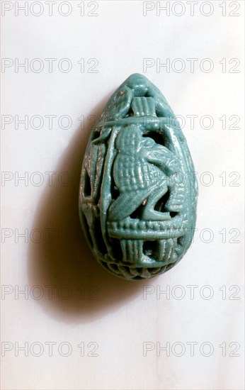 Amulet in the form of an openwork cowrie shell