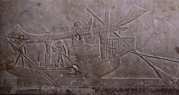 A limestone relief from the tomb of Ipi depicting a boat with its sail furled and carrying a huge block of stone
