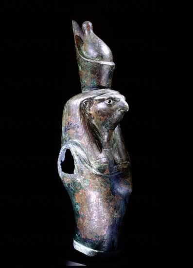 Fragment of statue depicting Horus wearing the double crown of upper and lower Egypt