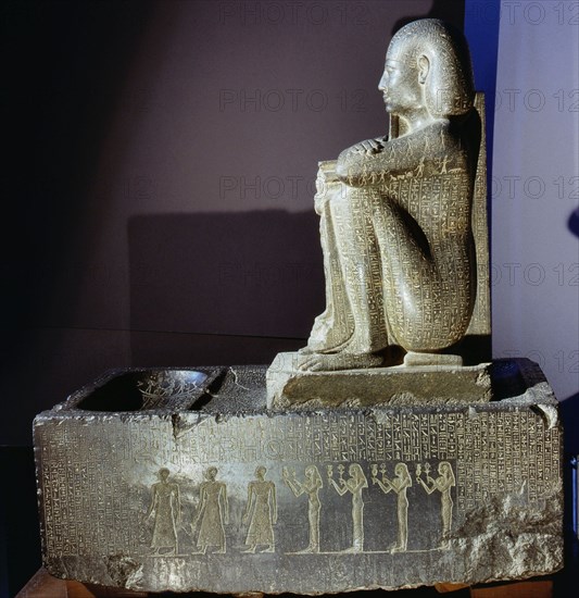 Block statue of Djedher, a fourth century official and sage, in the form of a temple guard