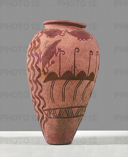 An urn decorated with a design of stylised ostriches