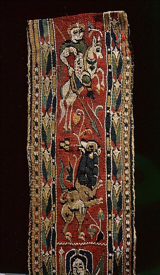 Detail of a Coptic textile, showing a mounted knight, possibly St