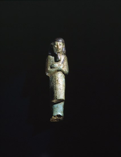 A faience overseer shabti from the burial of Takeloth II