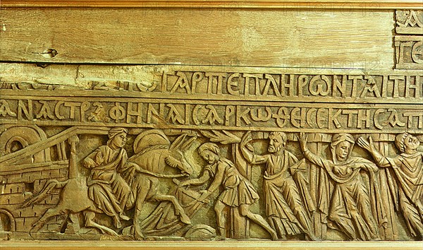 Detail from a wooden lintel depicting the entrance of Jesus in Jerusalem on Palm Sunday