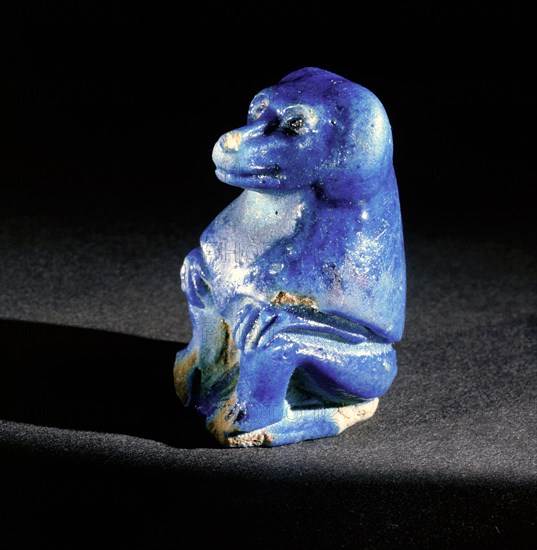 Faience figure of a seated baboon