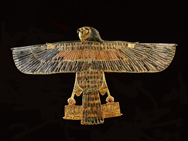 Inlaid gold pectoral in the form of a falcon with outstretched wings, from the tomb of Amenemope