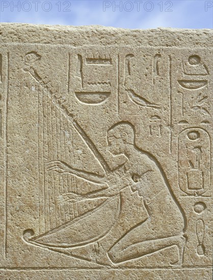 Detail of a relief depicting a musician, originally from the Red Chapel of Hatshepsut