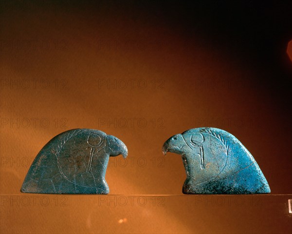 Necklace terminals in the shape of a falcon head