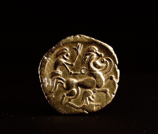 Coin showing a horse and rider