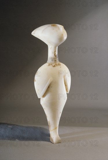 Cycladic figurine   star gazer, it belongs to the Louros type of the Grotta Pelos culture