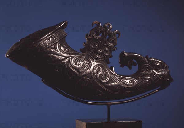 A buffalo horn container with the face of singa, the Batak version of the cosmic serpent Naga, used by shaman to store magic medicine