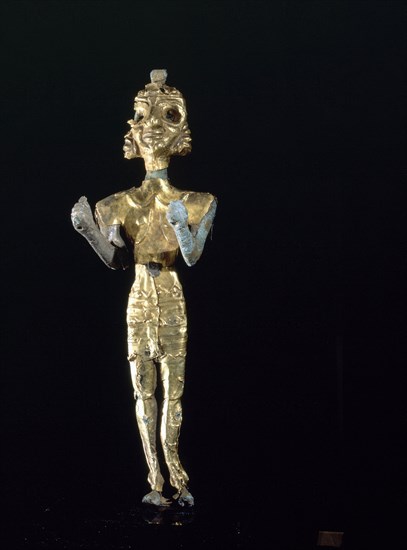 Canaanite gold and silver foil covered bronze figure of Baal - Photo12 ...