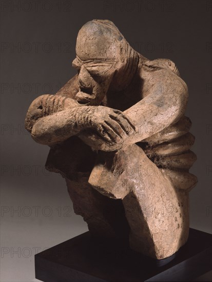 A terracotta figure of a man excavated from a tumulus in the Djenne/Mopti area between the Niger and Bani Rivers