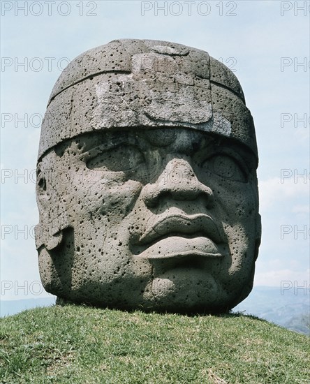 Massive stone head, possibly representing a planetary deity oran individual ruler, possibly deified and worshipped as ancestor