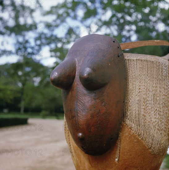 Body mask representing a pregnant female torso, worn during dances accompanying male circumcision rites