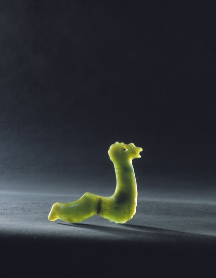 A small jade ornament depicting a Marakihau sea monster