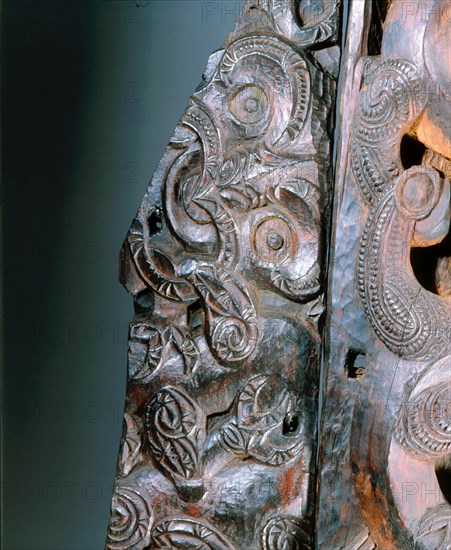 Five carved wooden end panels from a storehouse