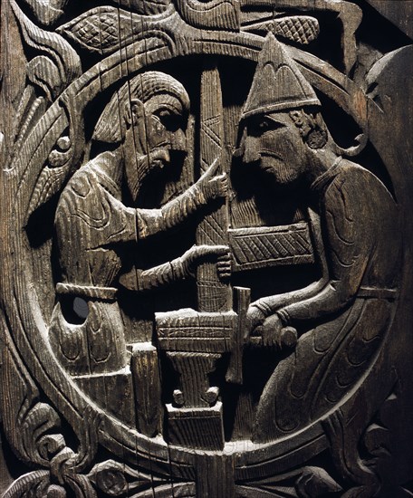 Stave church carving with a scene from the story of Sigurd