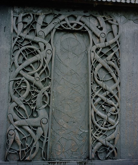 Carving on the side of the stave church at Urnes
