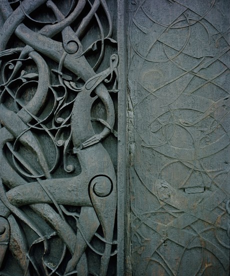 Detail of the carving on the side of the stave church at Urnes