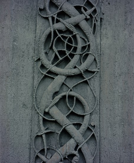 Detail of the carving on the side of the stave church at Urnes