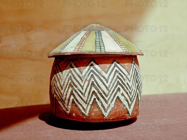 A painted pot and cover from Kerma in ancient Nubia