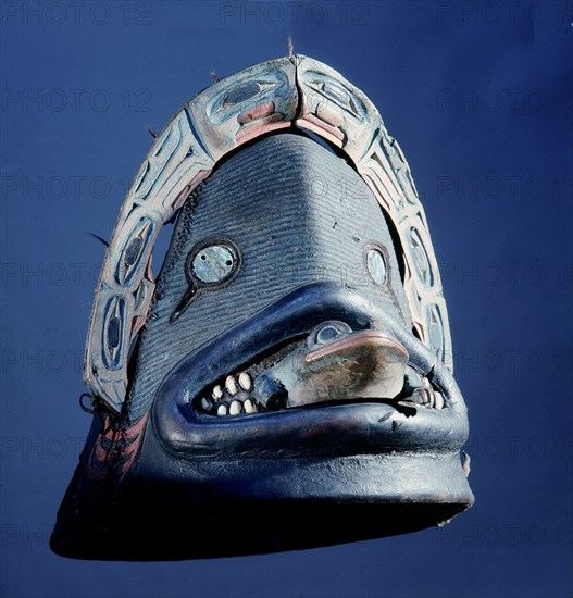 A defensive head piece made of wood and covered with leather