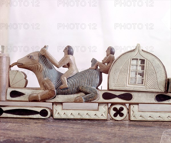 Wooden pipe inlaid with carved bone depicting a ship