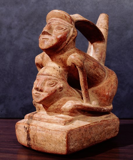 Stirrup spouted vessel depicting a copulating couple