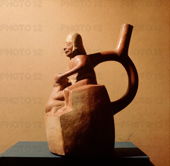 Stirrup spouted vessel depicting fellatio