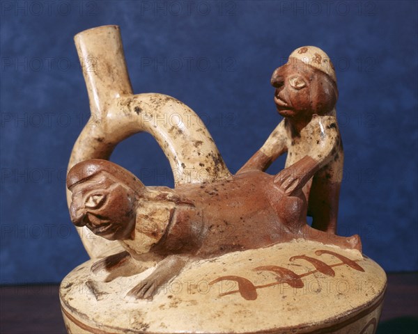 Stirrup spouted vessel depicting a copulating couple