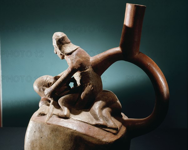 Stirrup spouted vessel depicting fellatio