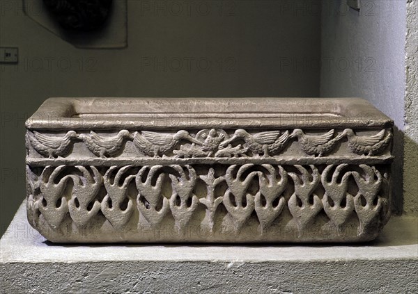 A rectangular marble ablution tank carved with design of birds and trees Country of Origin: Spain