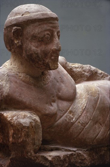 Statue of a reclining man found in a bath house at Meroe